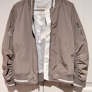 Tan color women jacket.